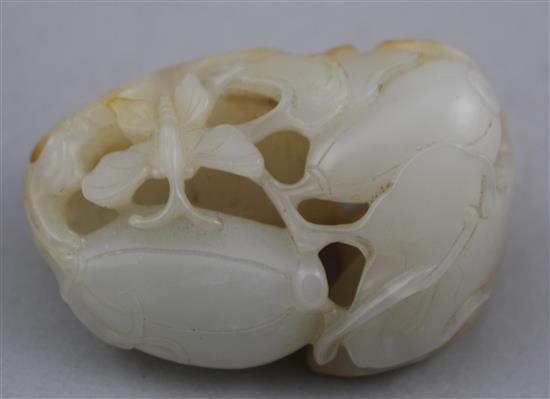 A Chinese white and russet skin jade melon carving, 19th century, 5.1cm